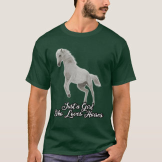 Camiseta Un Chica que ama a los caballos montando en broma