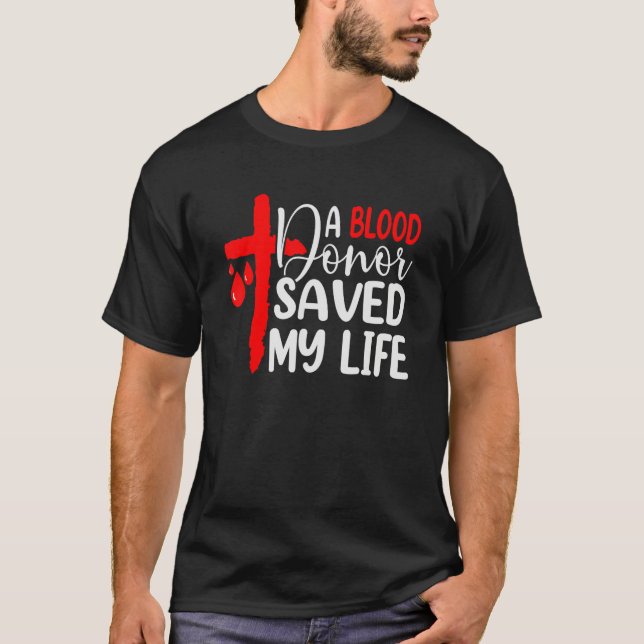 Camiseta Un Donante De Sangre Salvó Mi Vida, Jesús Murió En (Anverso)