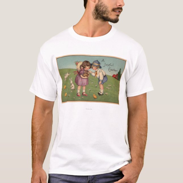 Camiseta Un EasterKids alegre que sostiene un conejito (Anverso)