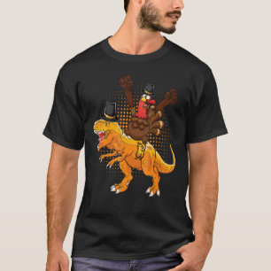 Camiseta Un feliz pavo montando un dinosaurio que llevan go