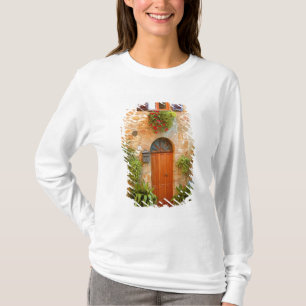Camiseta Un gato busca entrada a casa en Pienza, Italia.