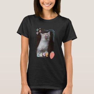 Camiseta Un gato lindo que pega una ventana Mascotas gatito