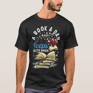 Camiseta Un libro al día mantiene la realidad lejos de la l