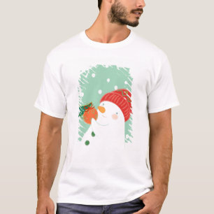 Camiseta Un muñeco de nieve que cuelga un ornamento en un