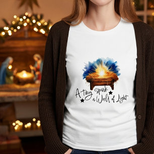 Camiseta Un pequeño destello un mundo de Luz pesebre navida
