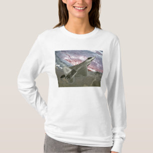 Camiseta Un rapaz F/A-22 vuela una misión de entrenamiento