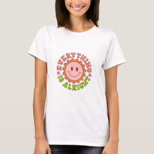 Camiseta Una cara sonriente con una flor y las palabras de