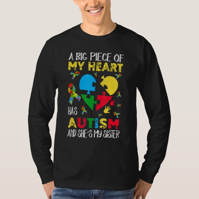 Camiseta Una gran pieza de mi corazón tiene autismo, ella e (Anverso)