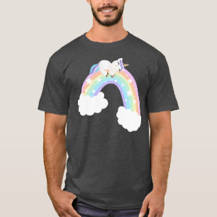 Camiseta Unicornio lindo sobre un arcoiris