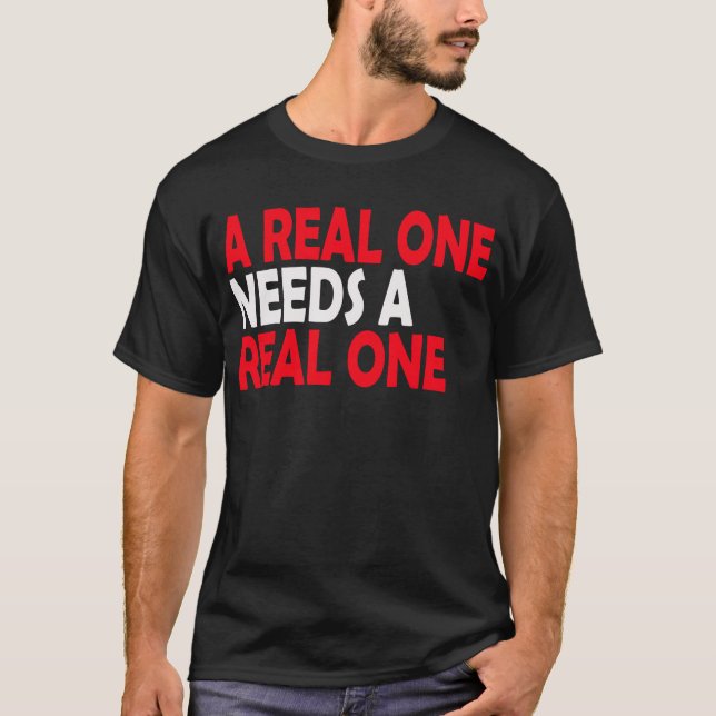 Camiseta Uno Real Necesita Uno Real. (Anverso)