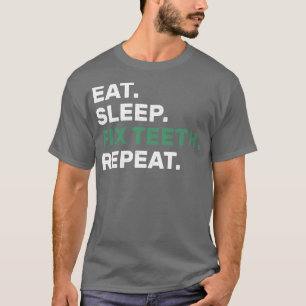 CAMISETA VINTAGE EAT SLEEP FIX DIENTES REPETIR A DENTISTA D