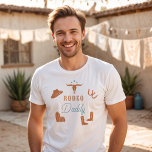 Camiseta WYNONA Naranja y Verde azulada chica Rodeo Papi<br><div class="desc">Esta camiseta presenta gráficos adorables de naranja y vaquera verde azulada y las palabras "papi rodeo" en una dulce combinación de letras de rodeo. Esta camisa de papá es el regalo perfecto para tu papá favorito, una camisa de fiesta de primer cumpleaños, o funciona como una gran idea de invitación...</div>
