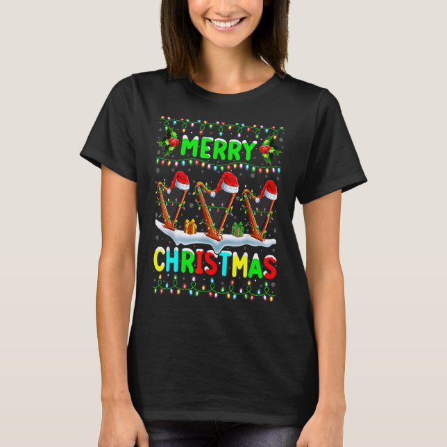 Camiseta Xmas Harp iluminando Santa Hat Feliz Faro de Navid (Anverso)