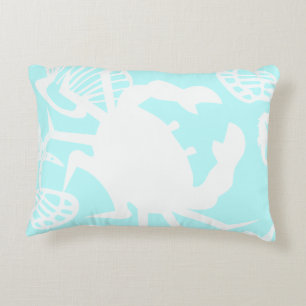 Cangrejo acuático y almohada de conchas marinas
