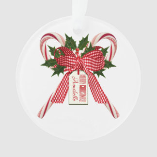 Cañones navideños bautizan adorno acrílico