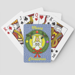 Cantando Navidades de ángel jugando cartas