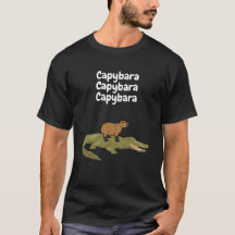 Capibara montado en una camiseta trasera de caimán