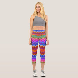 Capri A woman wears vibrant, zigzag-patterned leggings 
