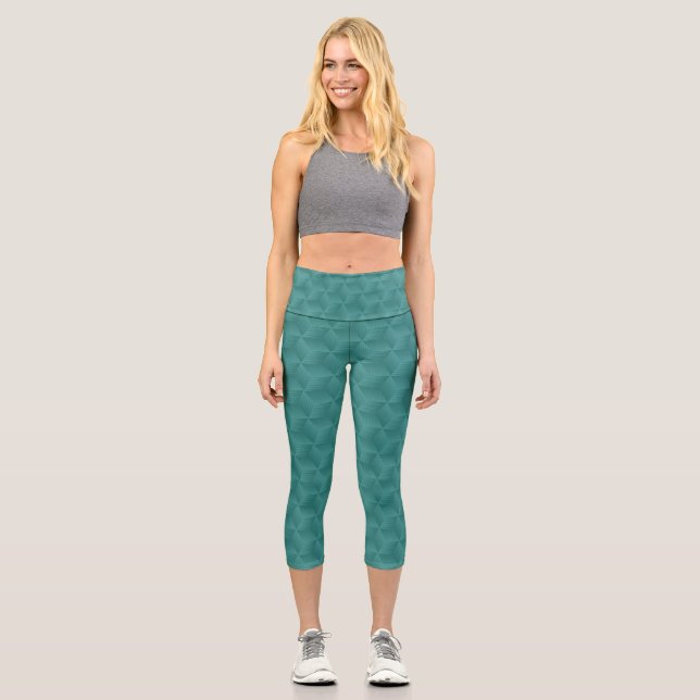 Capri Una persona lleva leggings turquesa con un geométr (Anverso)