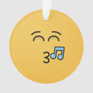 Cara silbando con ornamento de ojos sonrientes