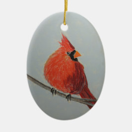 Cardenal rojo en rama en ornamento de pasteles