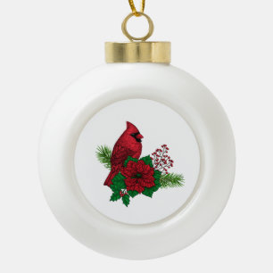 Cardenales rojos sobre decoración de Navidades