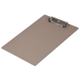 Carpeta De Pinza una pared marrón con un reloj en ella