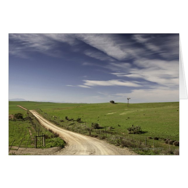 Carretera de finca que se desliza entre los campos (Anverso (Horizontal))