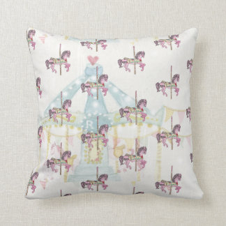 Carrusel azul con almohada de caballos