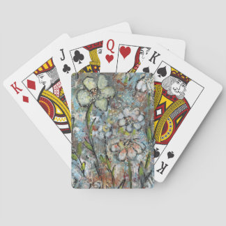 Cartas de juego con diseño floral de medios mixtos