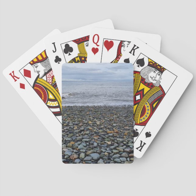 Cartas de juego en la playa de guijarros (Reverso)