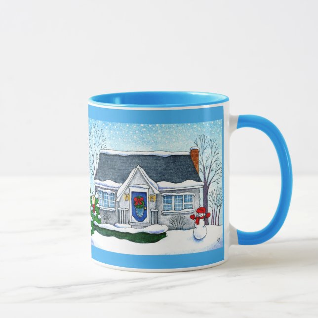 Casa linda del navidad con la taza del muñeco de (Derecha)