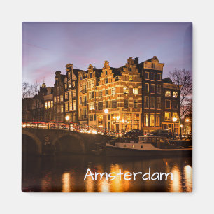 Casas del canal de Amsterdam en el imán del texto