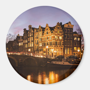 Casas del canal de Amsterdam en el imán redondo d