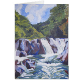 Cascada y cielo azul