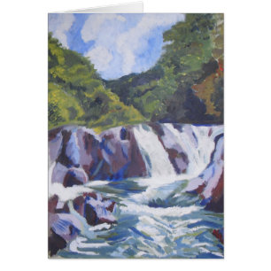 Cascada y cielo azul