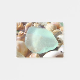 Cáscaras azules del vidrio del mar de las notas de