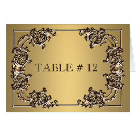 Cena boda con números de mesa ornamentados con oro