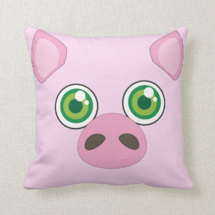Cerdo lindo con la almohada rosada de los ojos