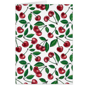 Cerezas rojas en blanco