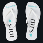 Chanclas Blue Mrs Flip Flops| Boda de novias personalizadas<br><div class="desc">¡Un lindo añadido a su playa de destino o boda de piscina! Baile la noche en estos cómodos chancletas de brida. La palabra "señora", un corazón azul acuático y el nombre de las novias personalizado. Para ver las chancletas del novio, por favor visite mi tienda "La Princesa Hungaricana" en www.zazzle.com/hungaricanprincess*....</div>