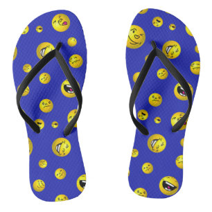Chanclas bolas de emoji sobre fondo azul