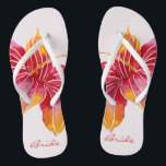 Chanclas Bride Floral Hawaiano Flip Flops<br><div class="desc">NewparkLane - Prepárate para el verano con estas elegantes y coloridas chanclas, con una exótica flor hawaiana de Hibiscus en rojo, rosa y naranja, con "Bride" en elegante tipografía de escritura. Un tema bohemio divertido y colorido para una boda de destino. Fácil de personalizar en Zazzle con su propio texto...</div>