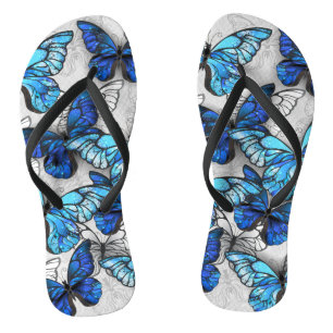 Chanclas Composición de las mariposas blancas y azules