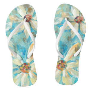 Chanclas Daisises blancos sobre el azul