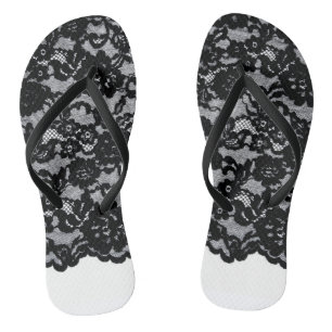 Chanclas Flips-flopes negros antiguos del cordón