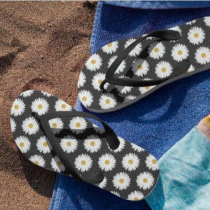 Chanclas Patrón floral de margarita blanca sobre negro