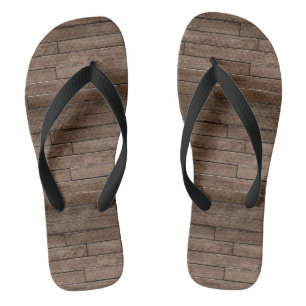 Chanclas Planchas de madera pequeña en el suelo