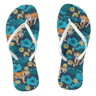 Chanclas Tigres en el estanque amarillo de loto