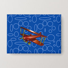 Chapa Bi-plano rojo en círculos azules y bucles